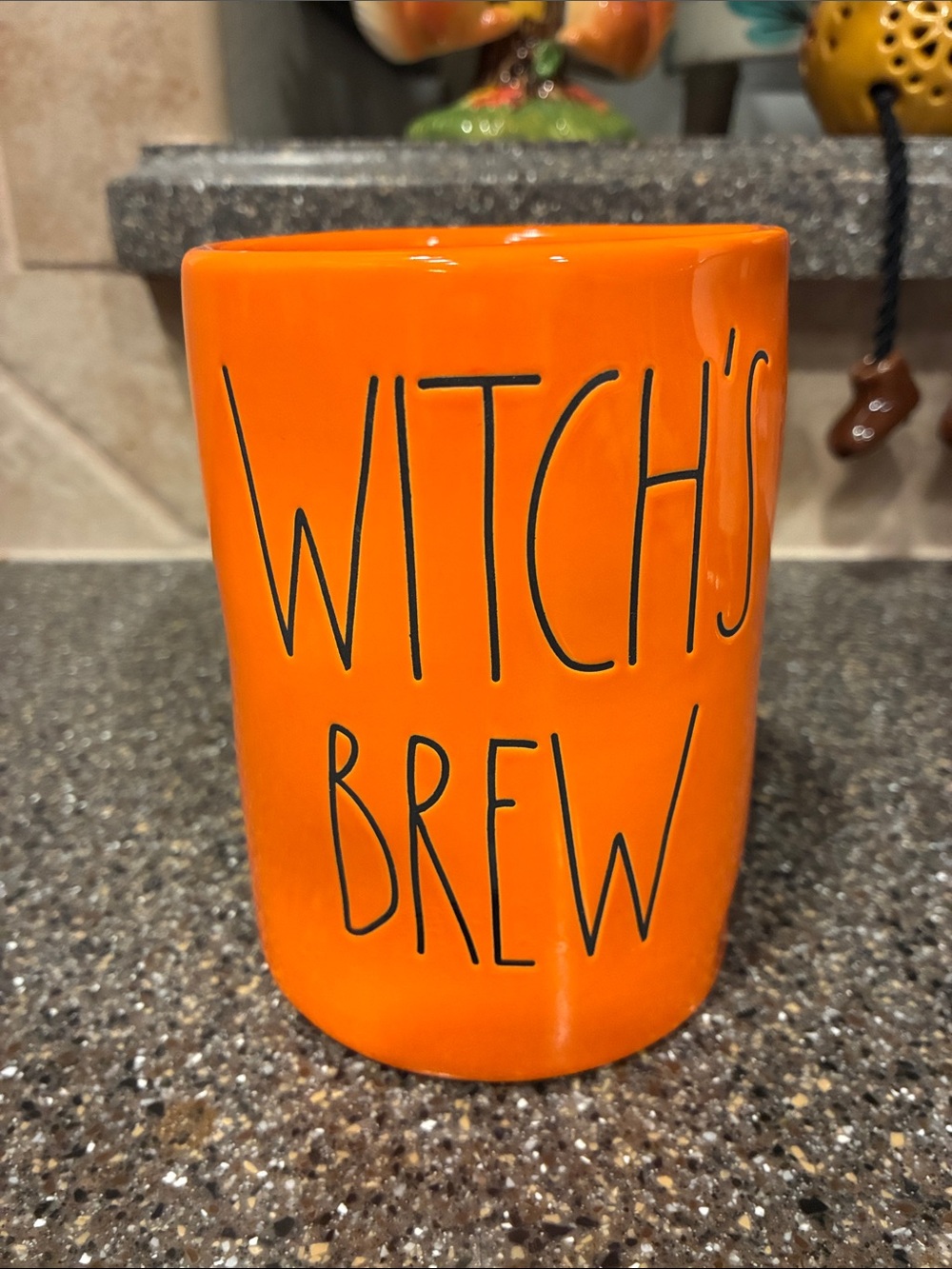 Rae Dunn Halloween Orange "Witch's Brew" Ceramic caramel apple candle.